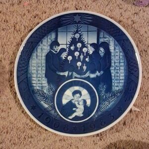 Porcelain commemorative plate titled 'Merry Christmas' by Royal Copenhagen 75th